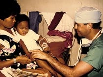 Dr. Toledo with Child Dr. Toledo with Child
